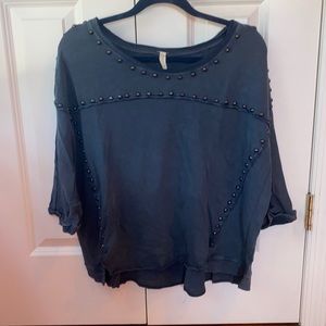 Navy flowy top with metal stud detailing